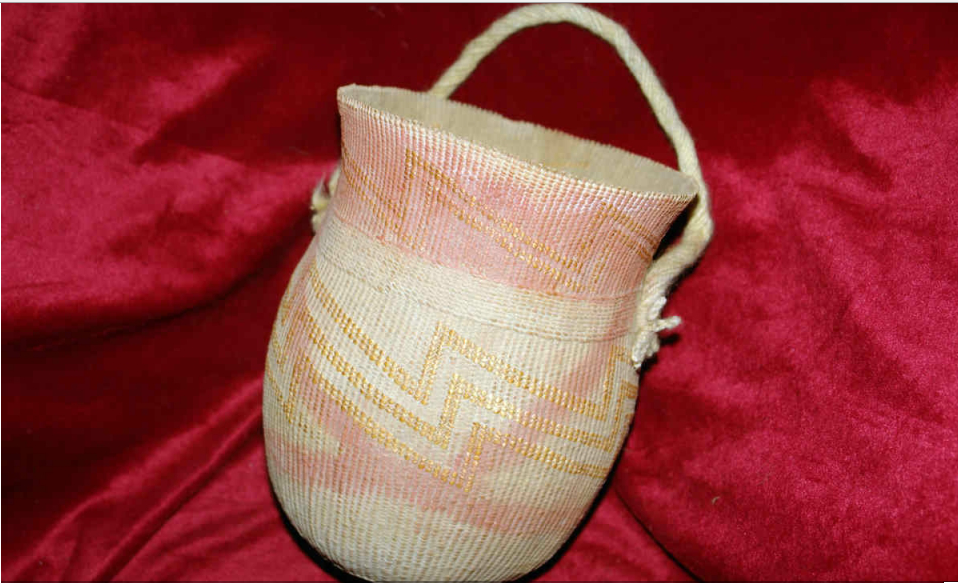 A basket made of straw found at the Kungang tomb. PROVIDED TO CHINA DAILY